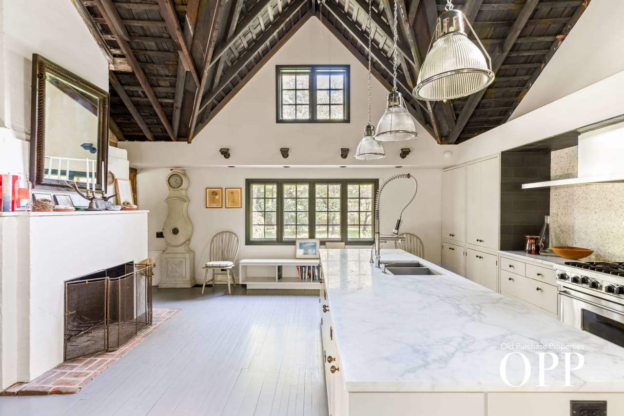 AN EXQUISITE CARRIAGE HOUSE