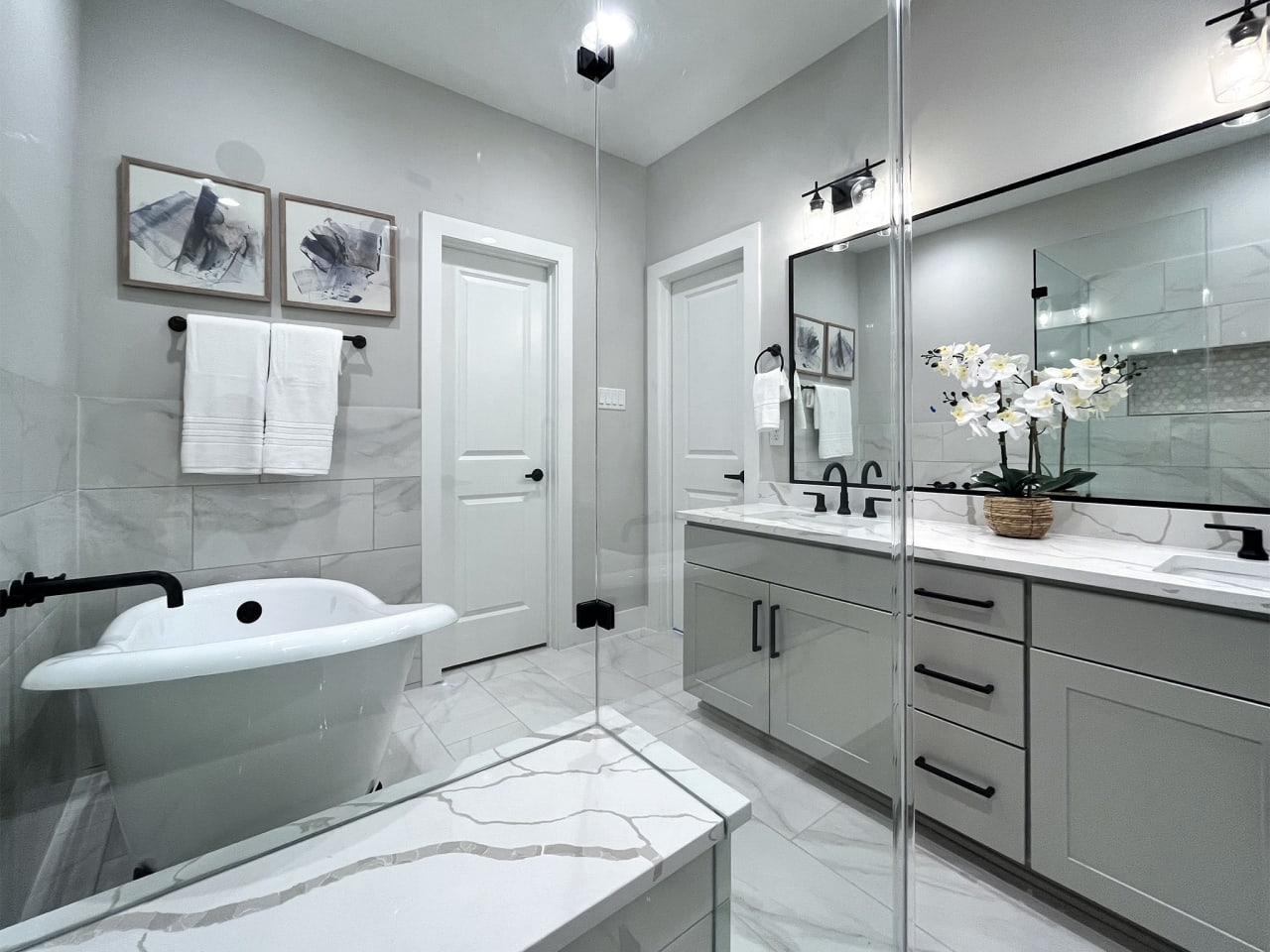 large master bathroom with white marble