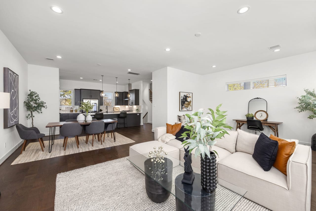 wide shot image of a living room and dining room