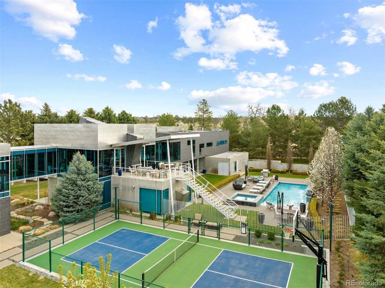 STUNNING and ARCHITECTURALLY MODERN Glass House is truly ONE-OF-A-KIND.