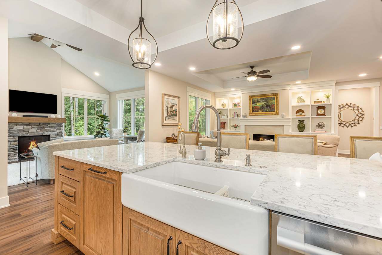 kitchen counter with sink and pendant lightings