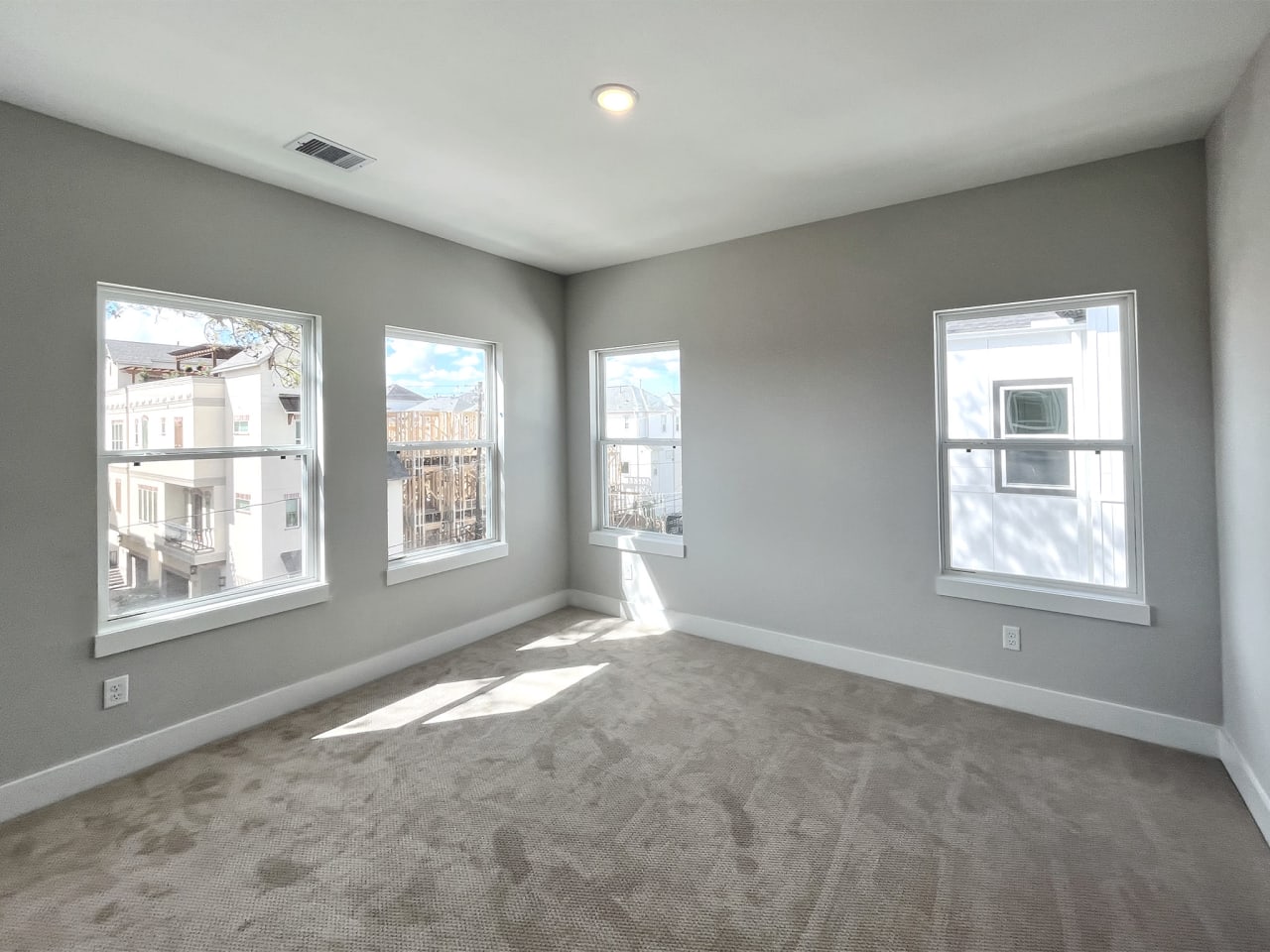 guest bedroom in a new home by Oracle City Homes