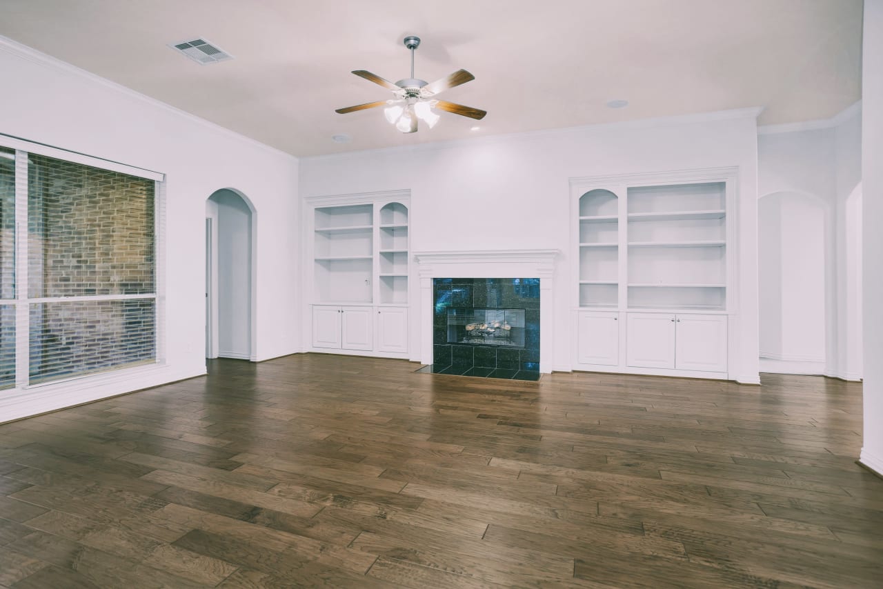 Gas fireplace with custom bookshelves and cabinets