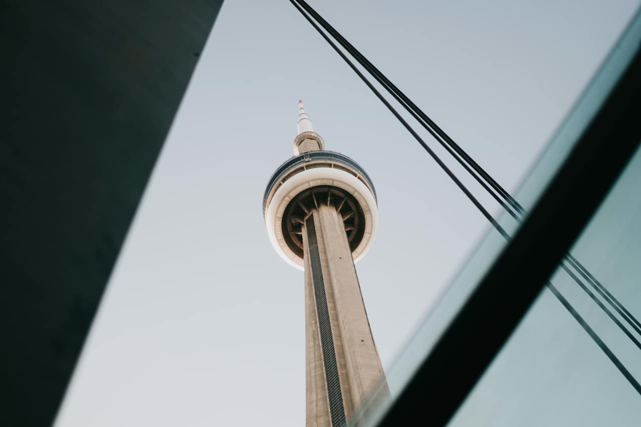 a low-angle perspective of the CN Tower