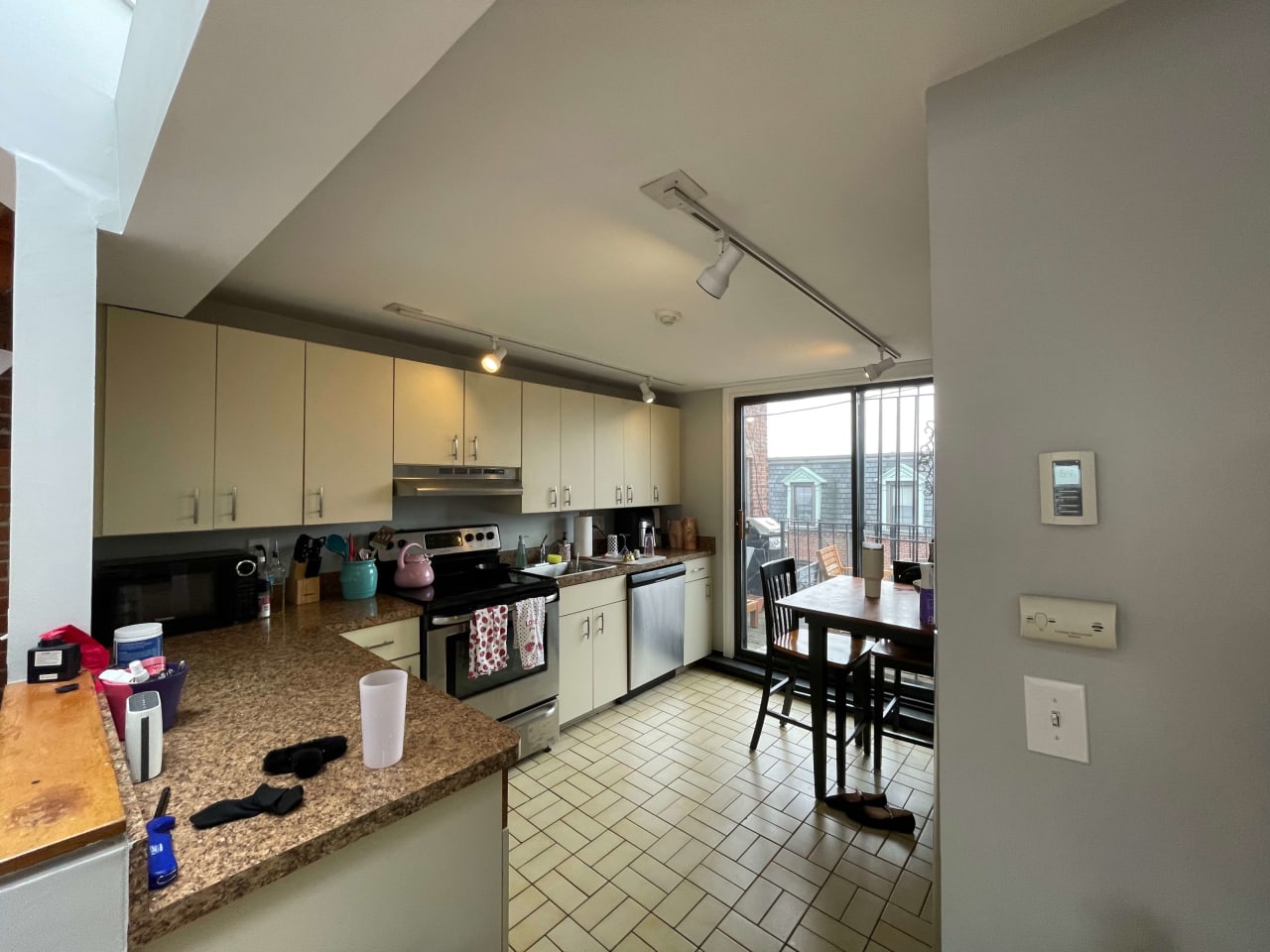 Unique Penthouse 1 bed w/ 2 Decks, exposed brick and laundry in unit! 