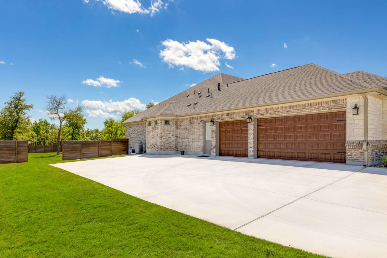 A impressive extended 3 car garage with a host of premium upgraded features throughout.