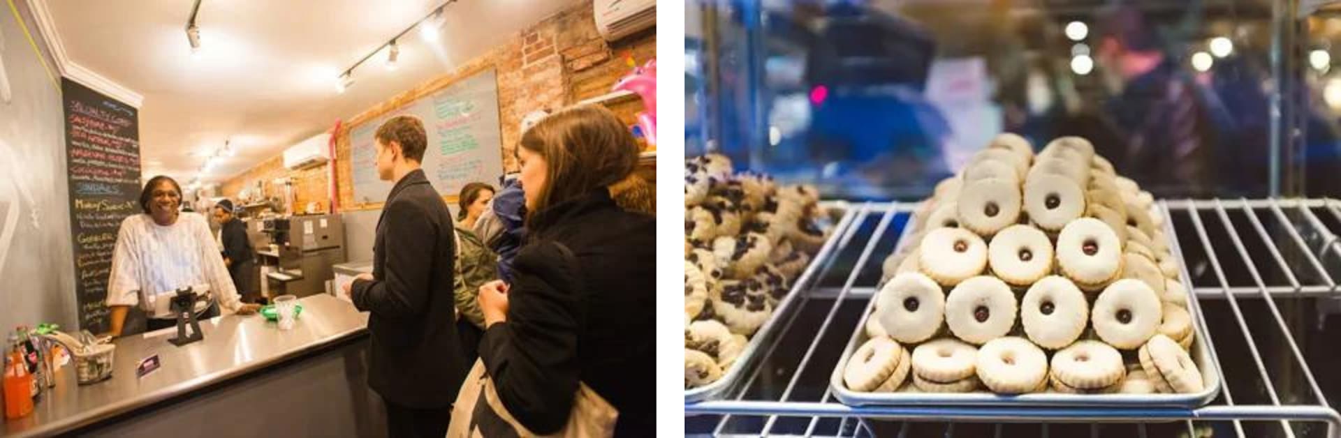 Customers at a bakery counter beside a tray of powdered cookies with dark centers.