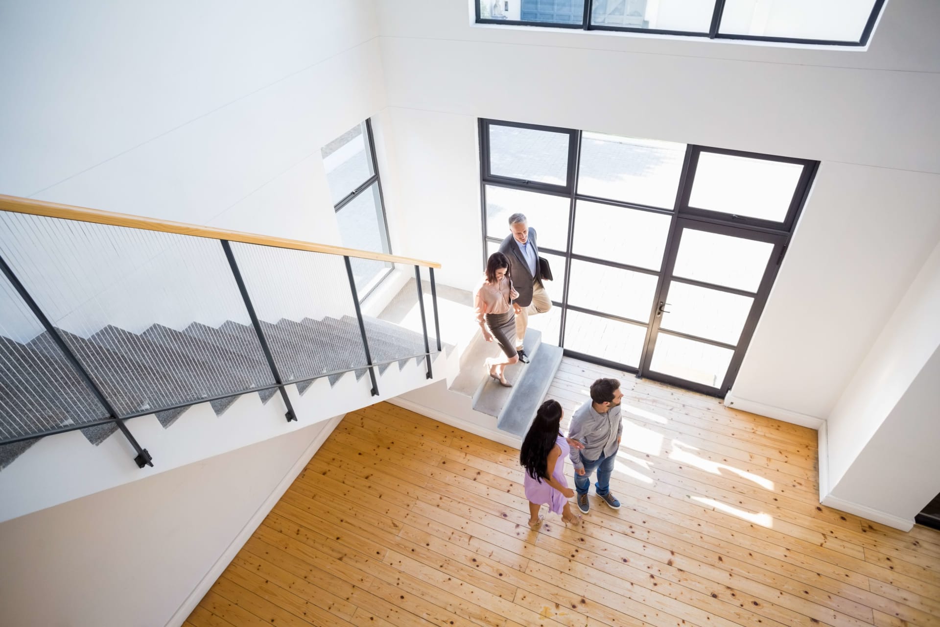 A real estate agent helping a person find the right investment property