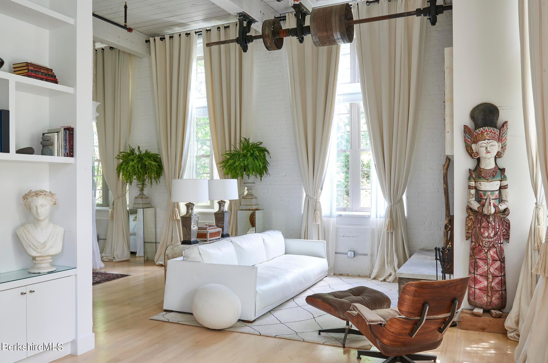 Living room with white couch in Great Barrington, MA