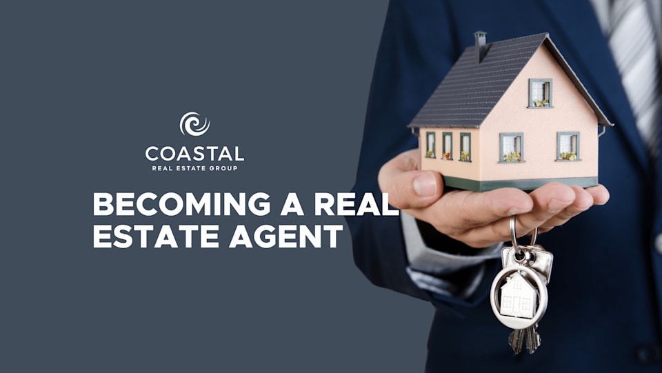 a real estate agent Coastal Real Estate Group