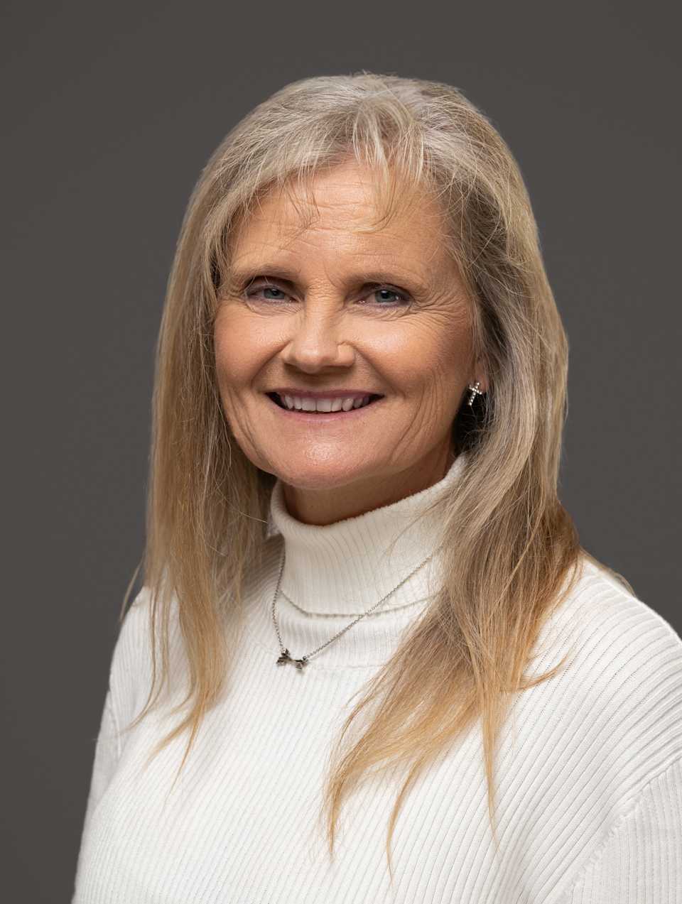 About Melodie “Mel” Dawn Noah Topper Real Estate