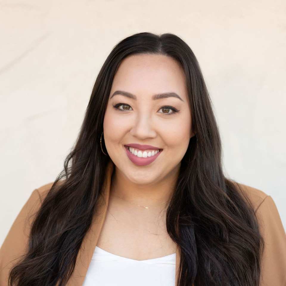 About Kina De Santis Reframe