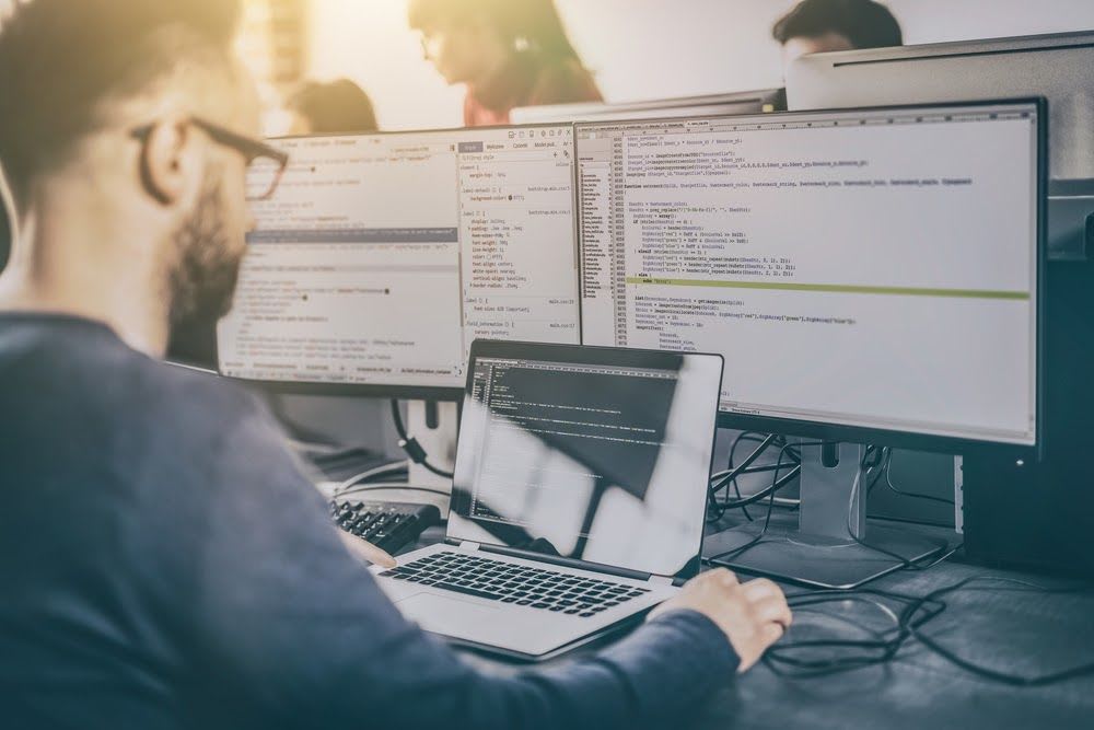 A man sitting at a computer.
