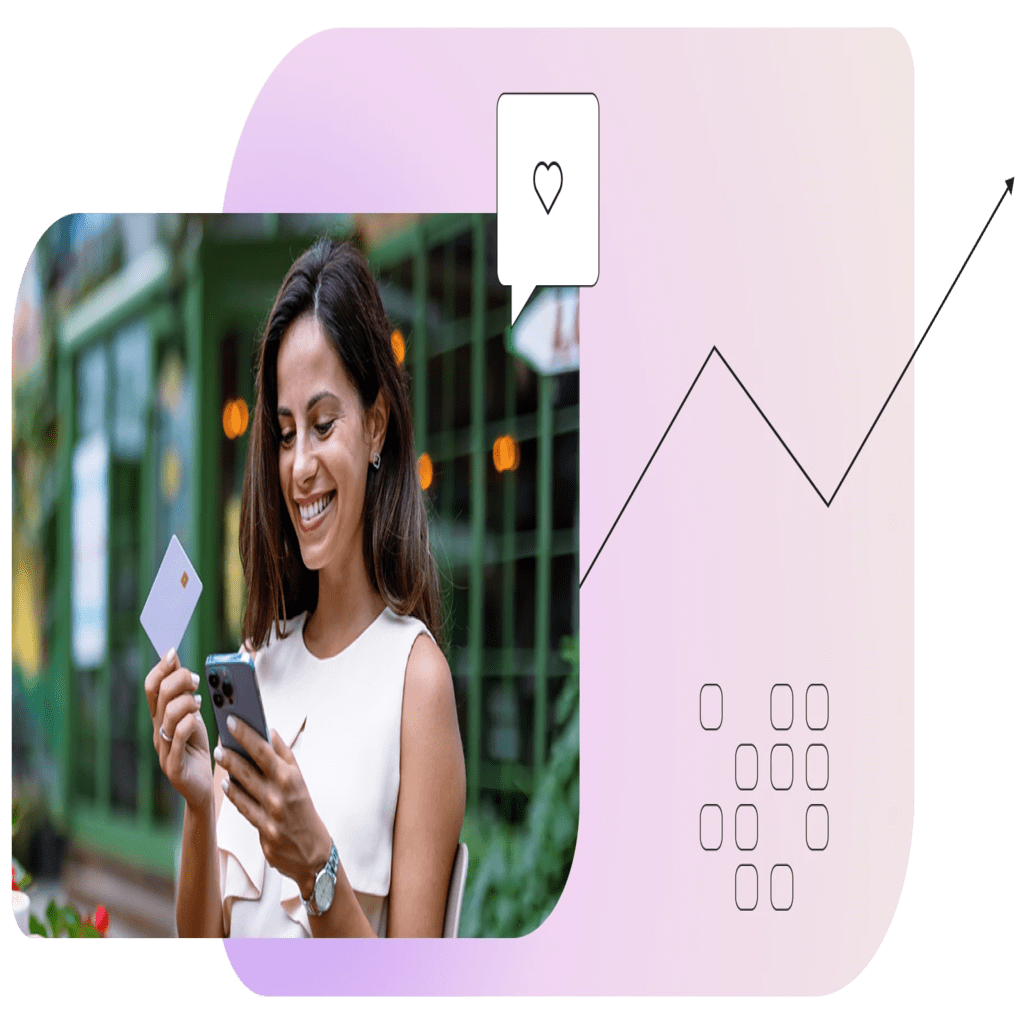 Woman holding credit card looking at phone