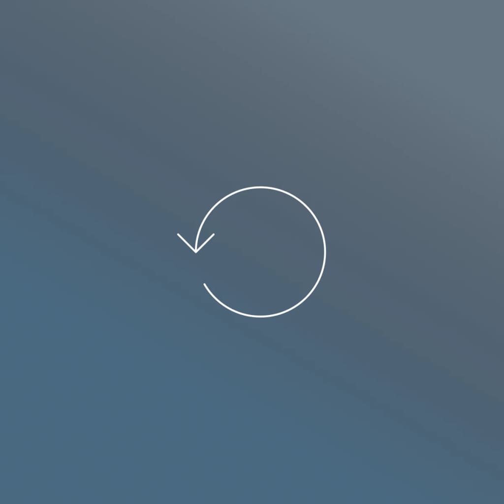 A circular arrow reverting backwards