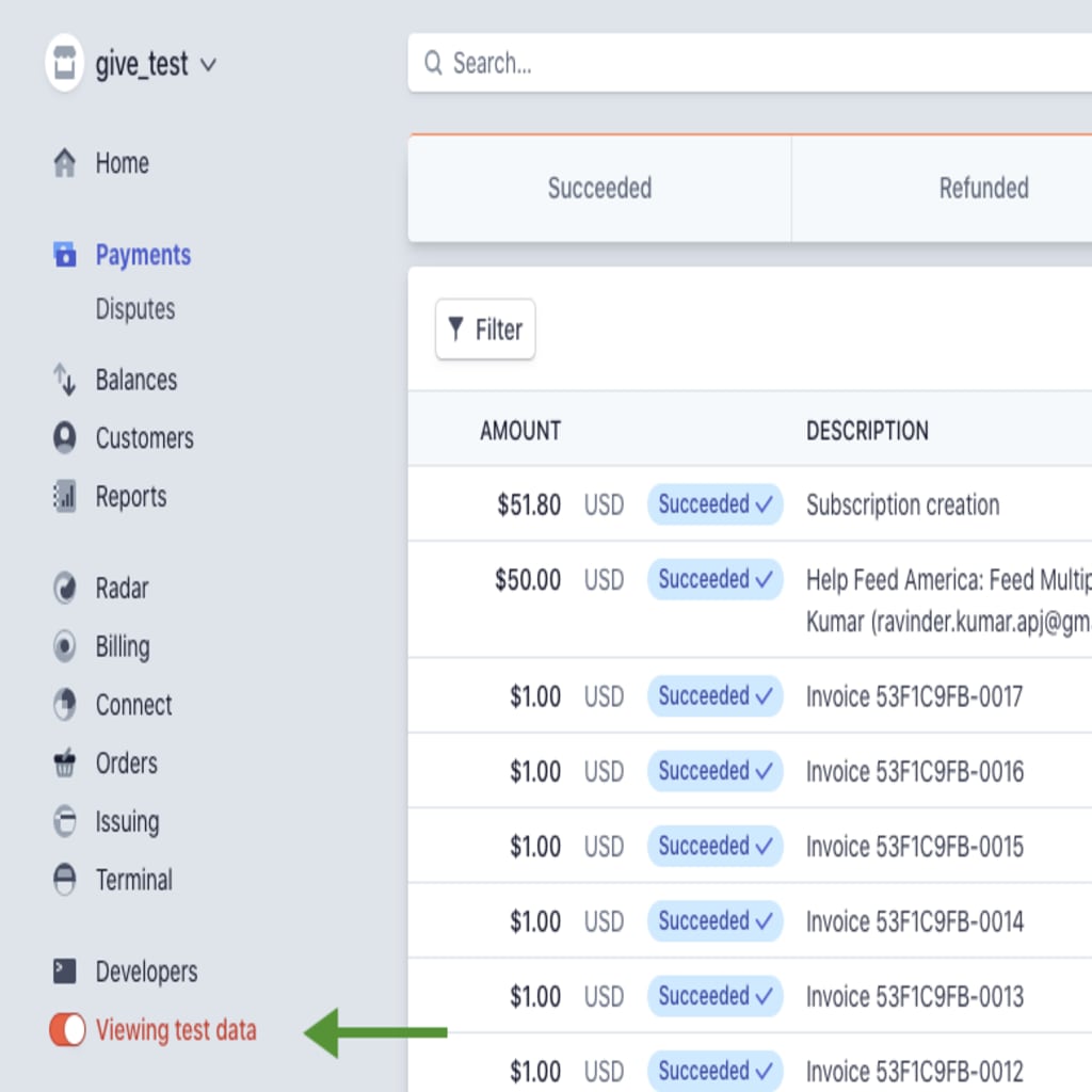 image of the Stripe dashboard with a green arrow pointing to the toggle for "view Test Data" in the bottom left of the screen.