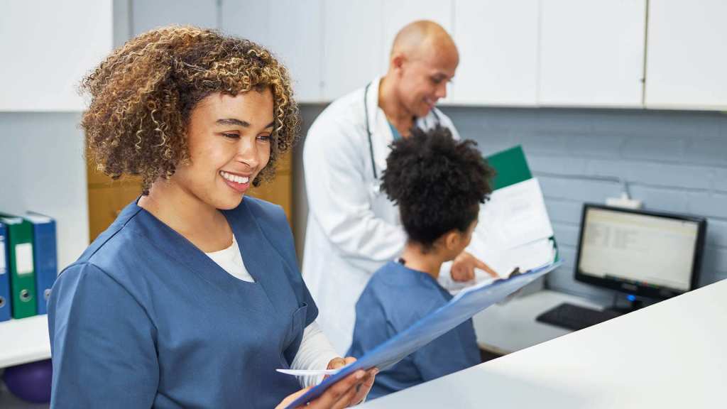 Nurse looking at chart