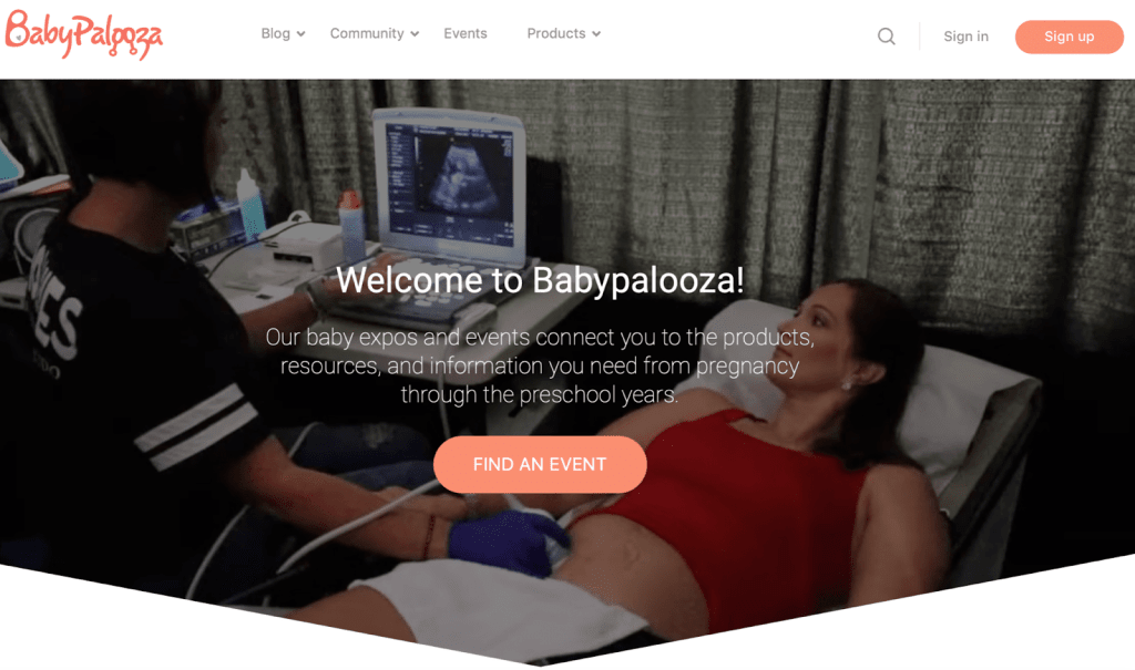 Babypalooza homepage. White header with orange logo and button to sign up. Hero area has an image of a nurse taking an ultrasound.