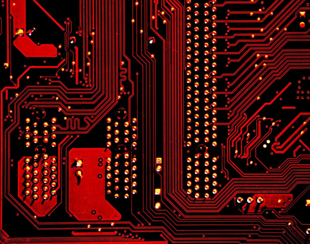 A photo of a computer board symbolize the help a web developer could get from technology to help their work-life balance.