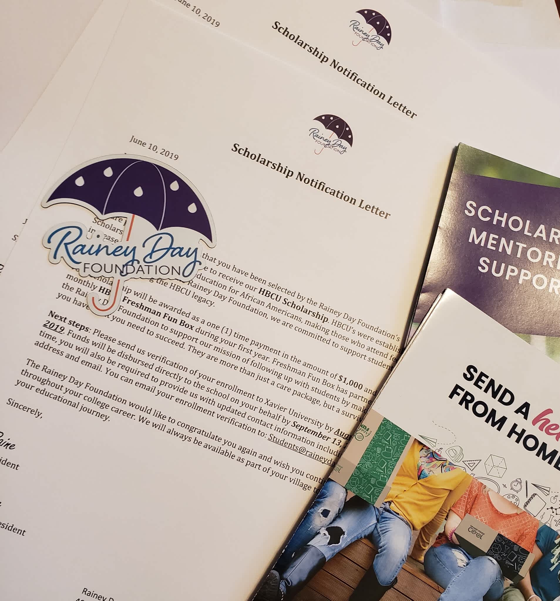 Rainey Day Foundation Nonprofit Sticker donor gifts alongside a thank you letter.