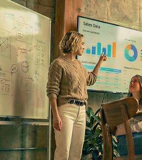 Female marketer reporting on sales data