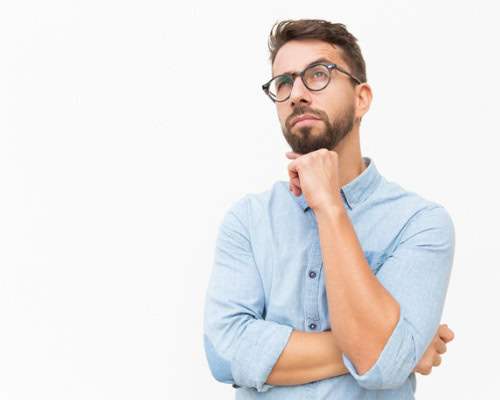 a man in glasses ponders capex vs opex cloud computing use cases