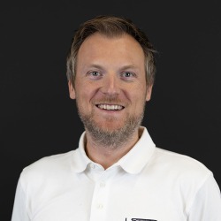 KRISTIAN H. TJELLAND