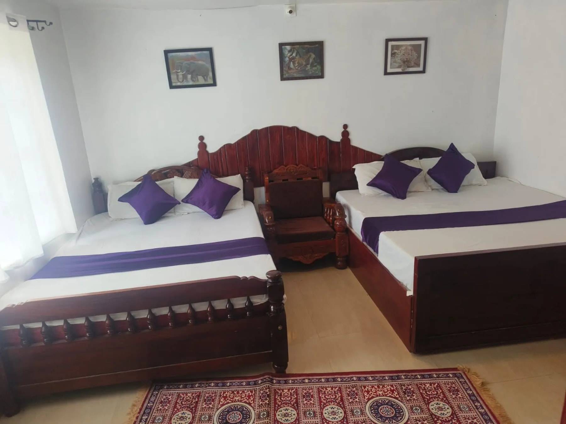 Family bedroom at Royal Aviary Cottage Fingerpost