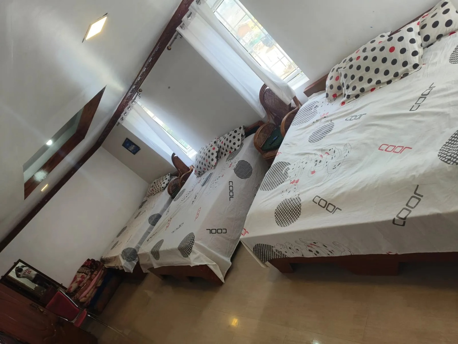 Guest bedroom at Royal Aviary Cottage Ooty