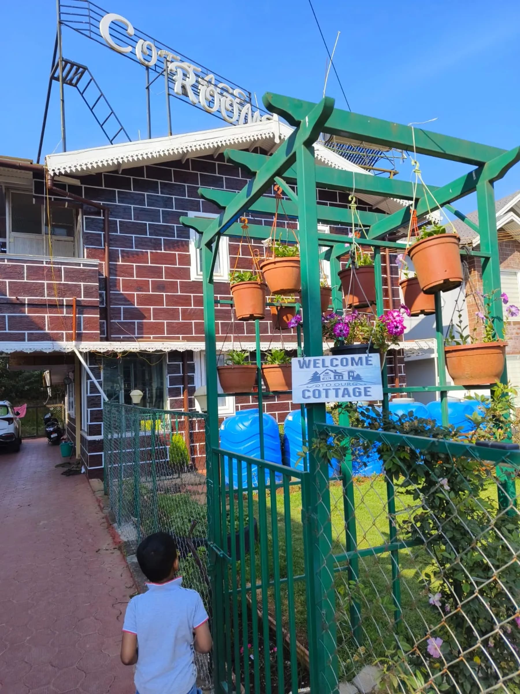 Outdoor garden space at Royal Aviary Cottage Ooty