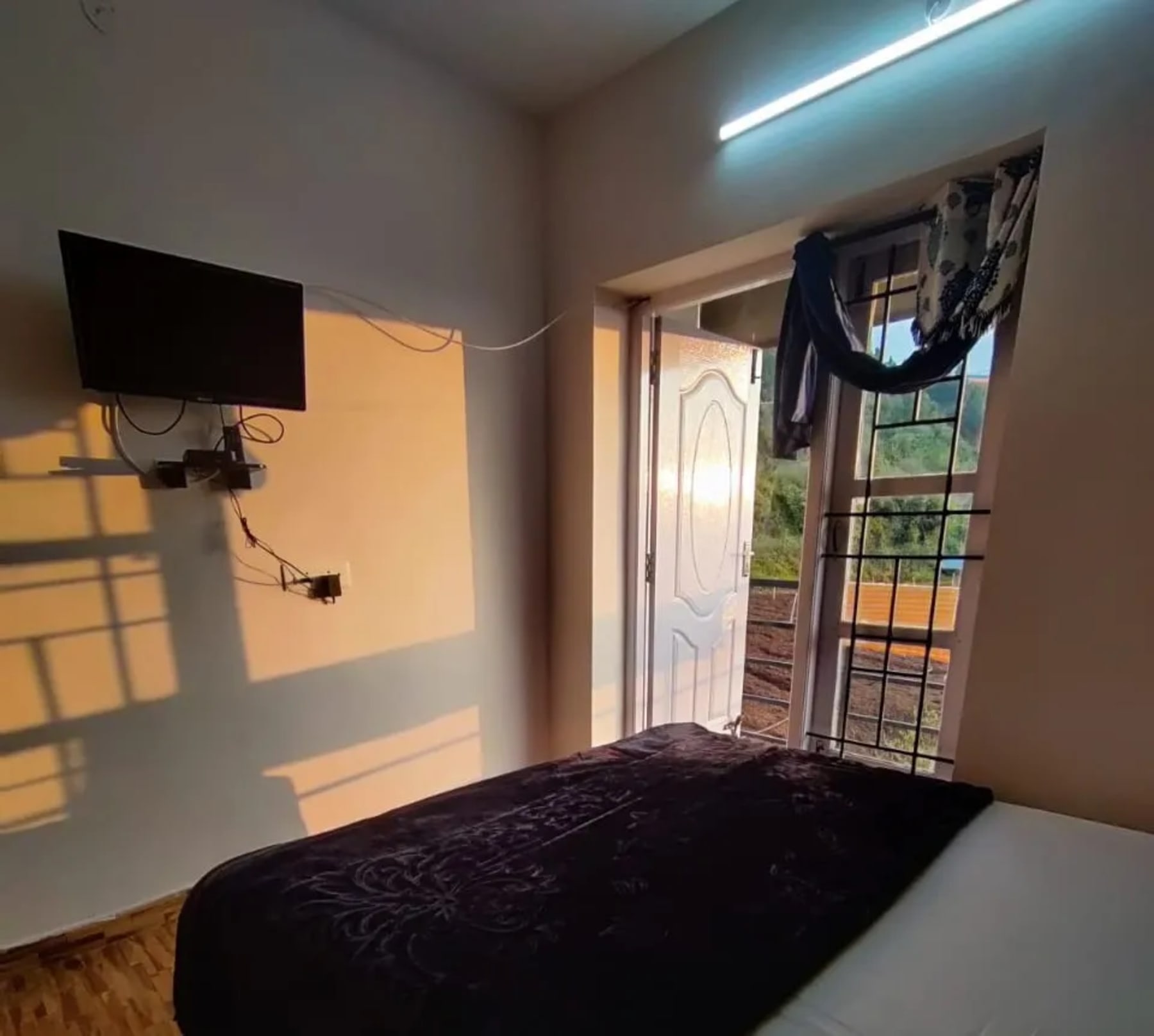Bedroom at Ooty Horizon Heights apartment in Ooty