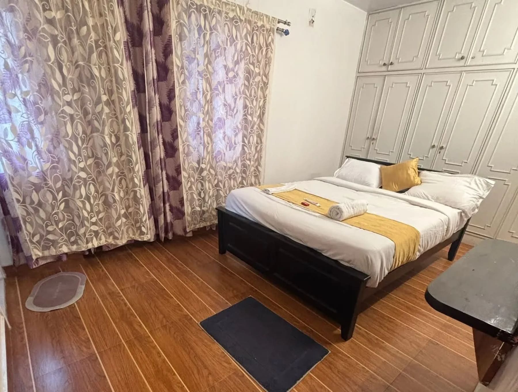 Spacious bedroom at PSR Cottage Ooty