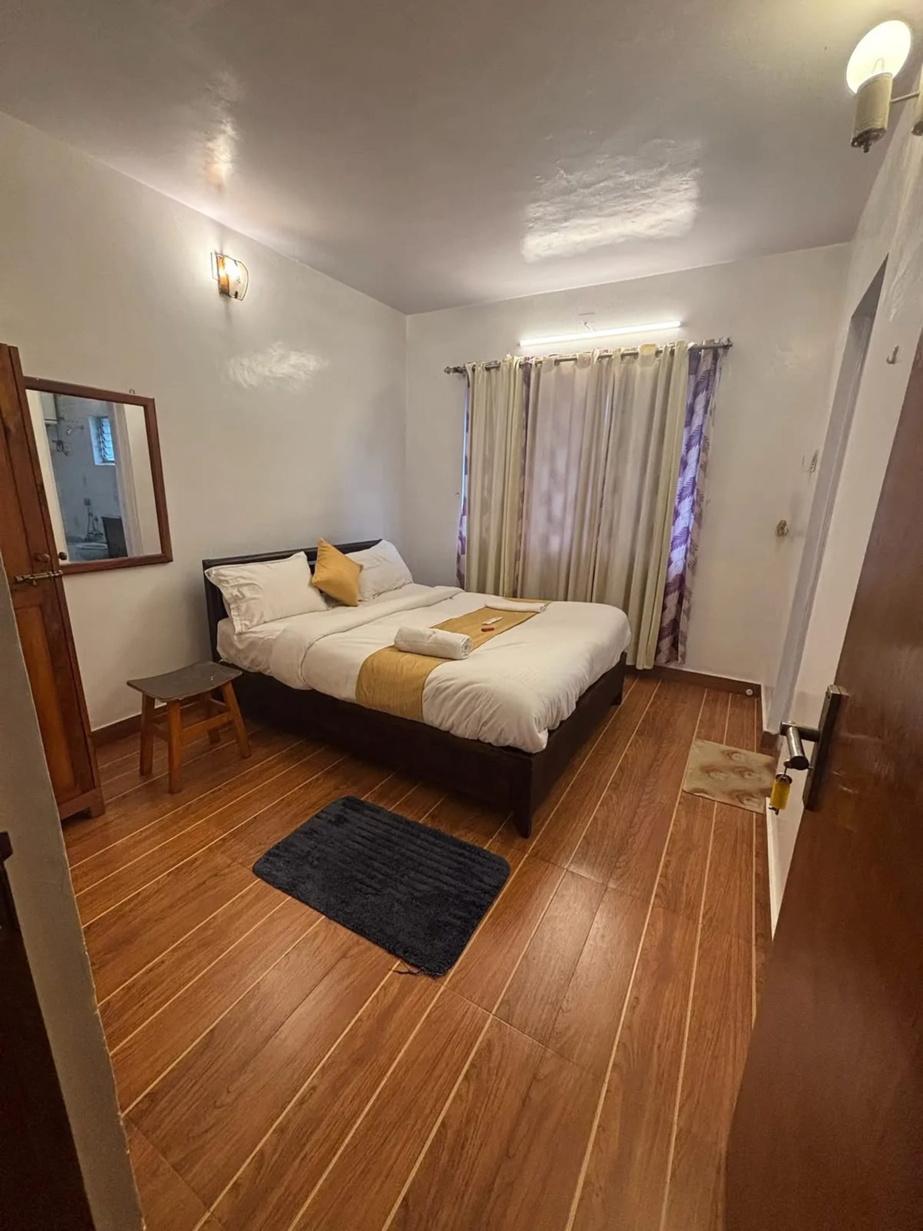 Family bedroom at PSR Rooms Ooty
