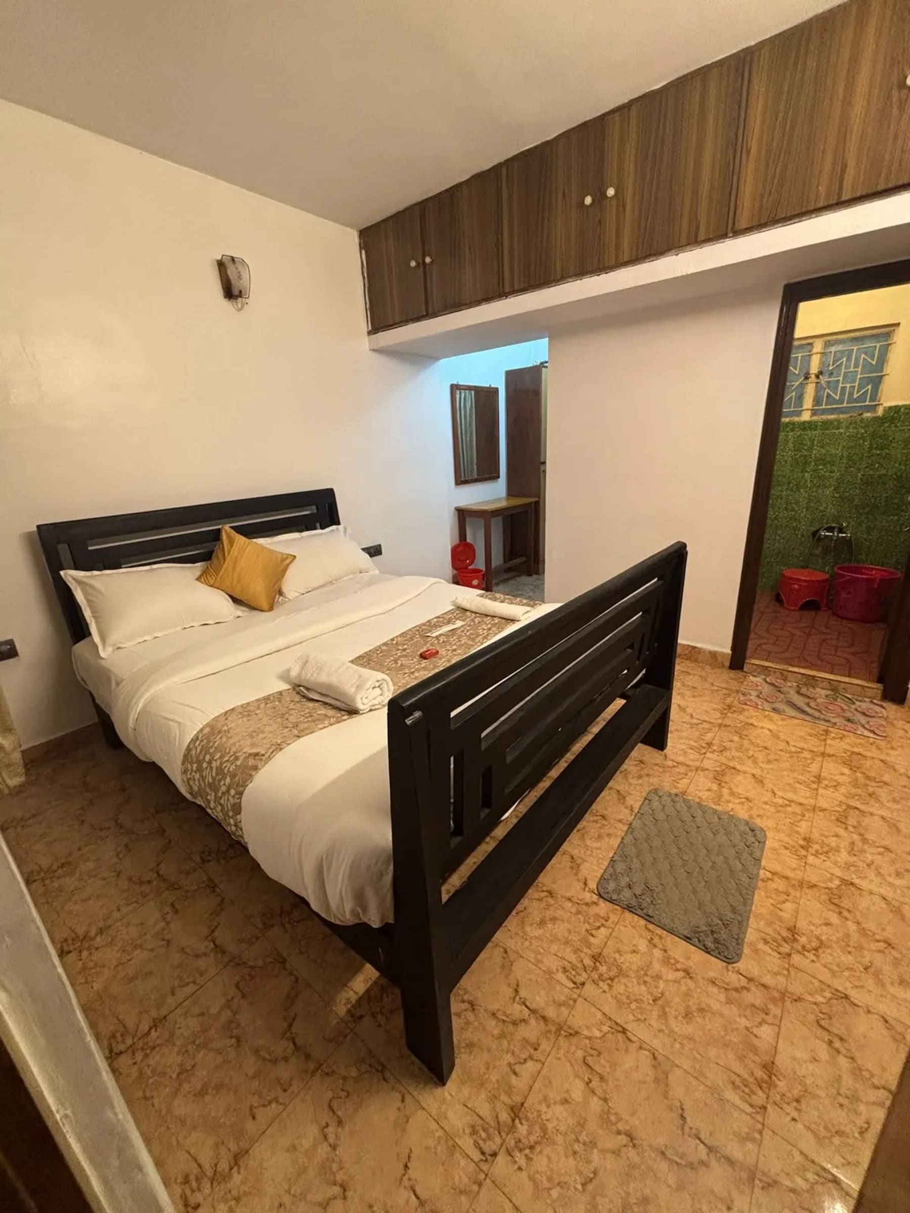 Group stay bedroom at PSR Rooms Ooty