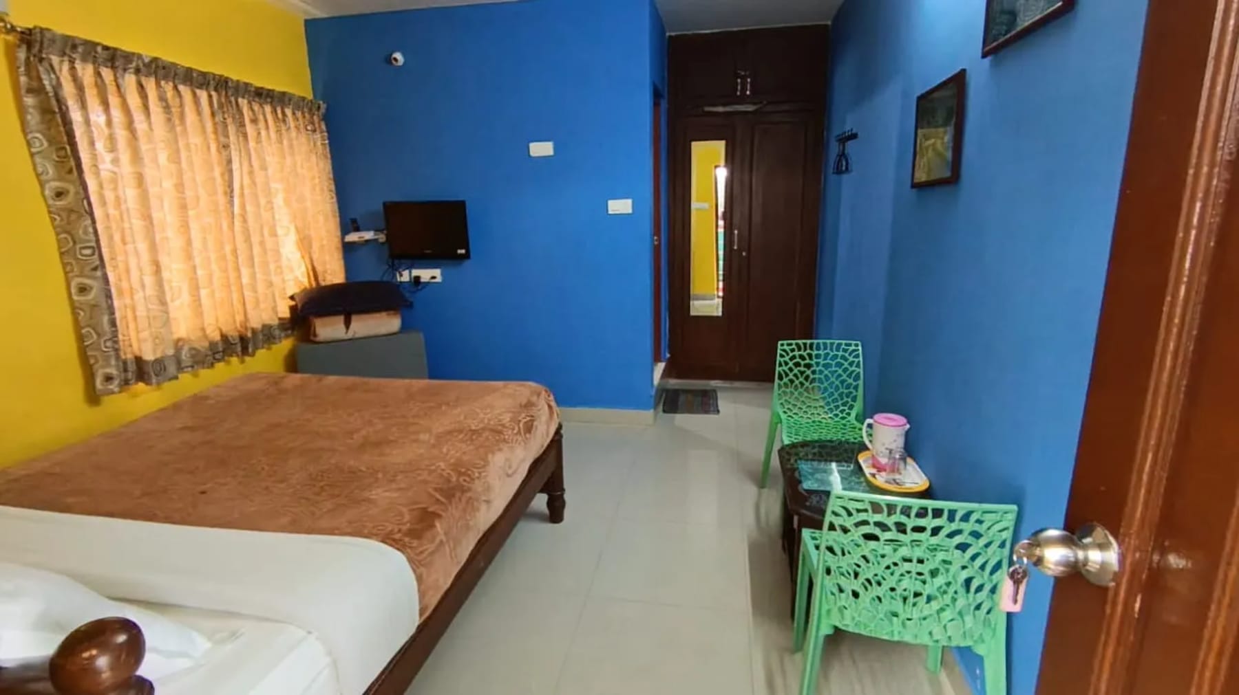 Modern bedroom interior at ADK Royal Park Inn homestay