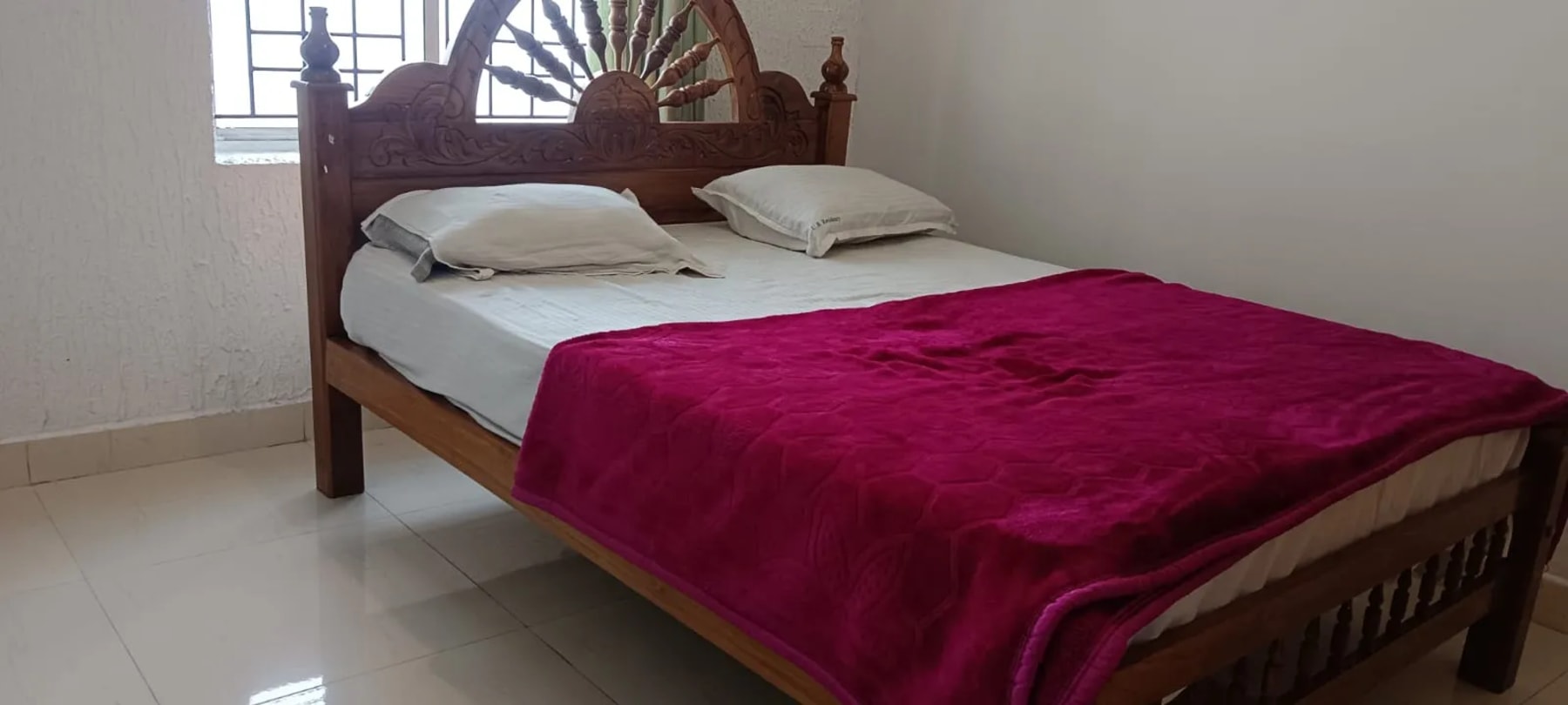 Clean private room at J.J. Homes in Ooty