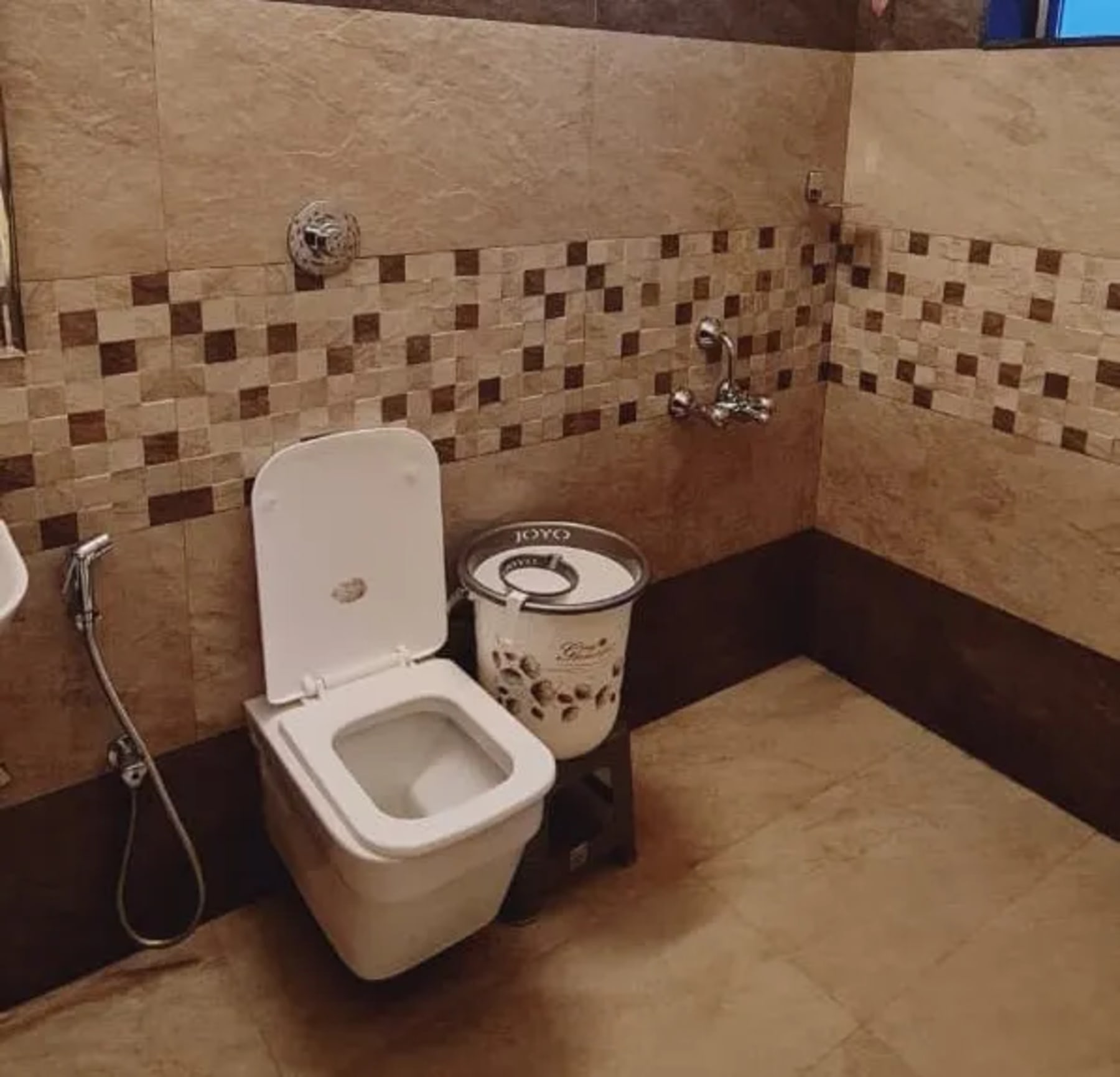 Clean bathroom with modern fittings at Central Residency