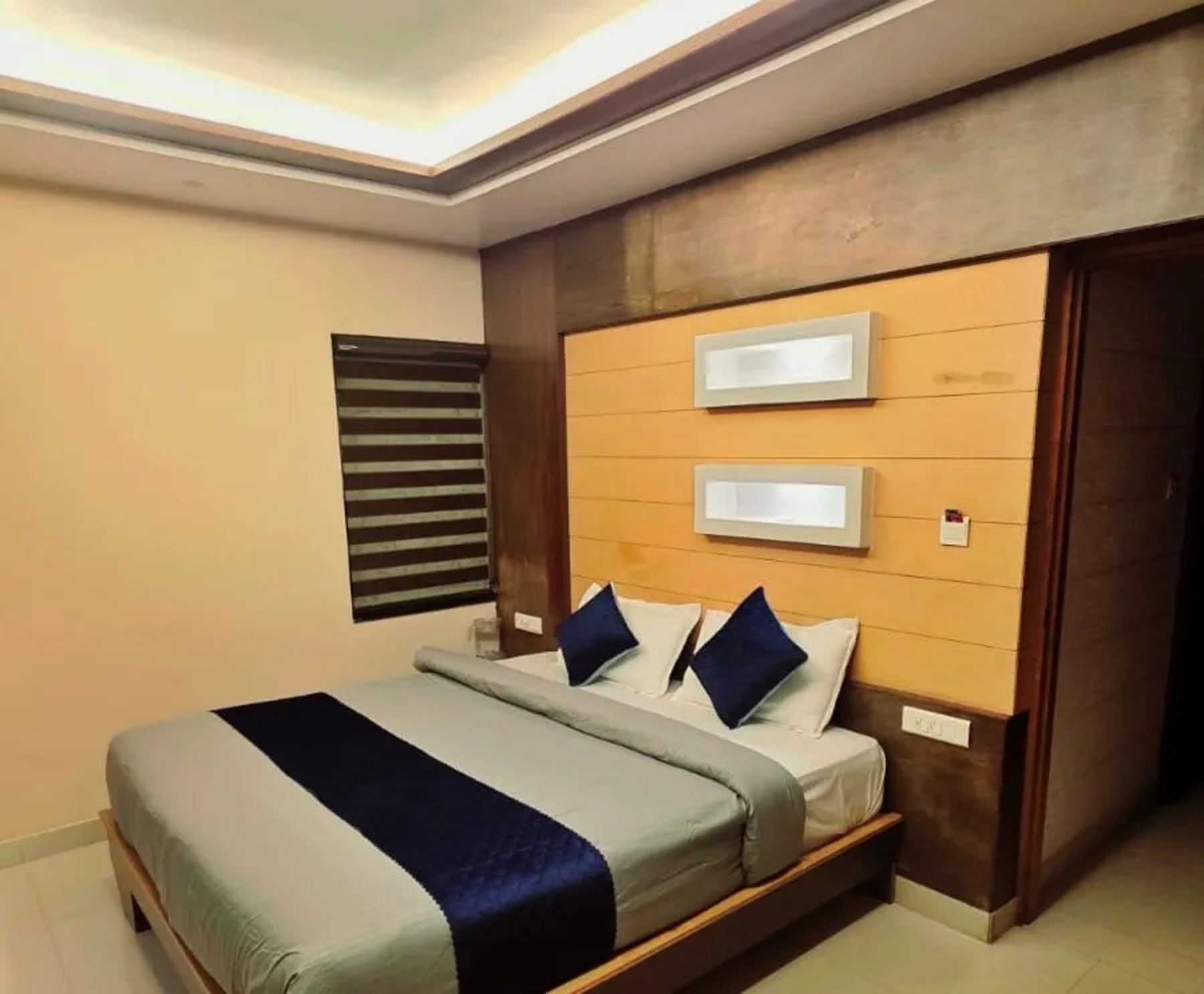 Modern bedroom at Central Residency homestay Ooty