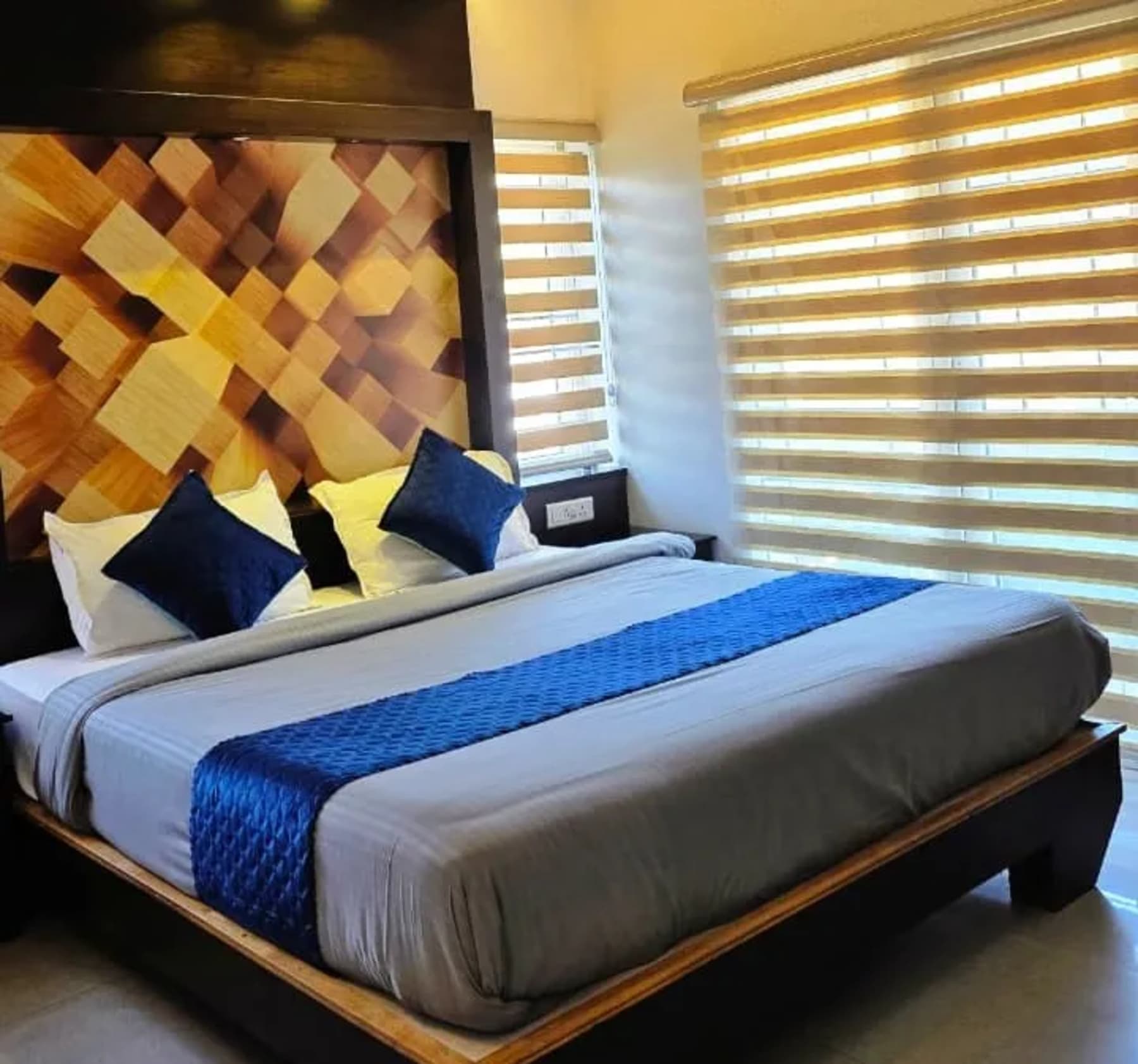 Comfortable bedroom at Central Residency in Ooty