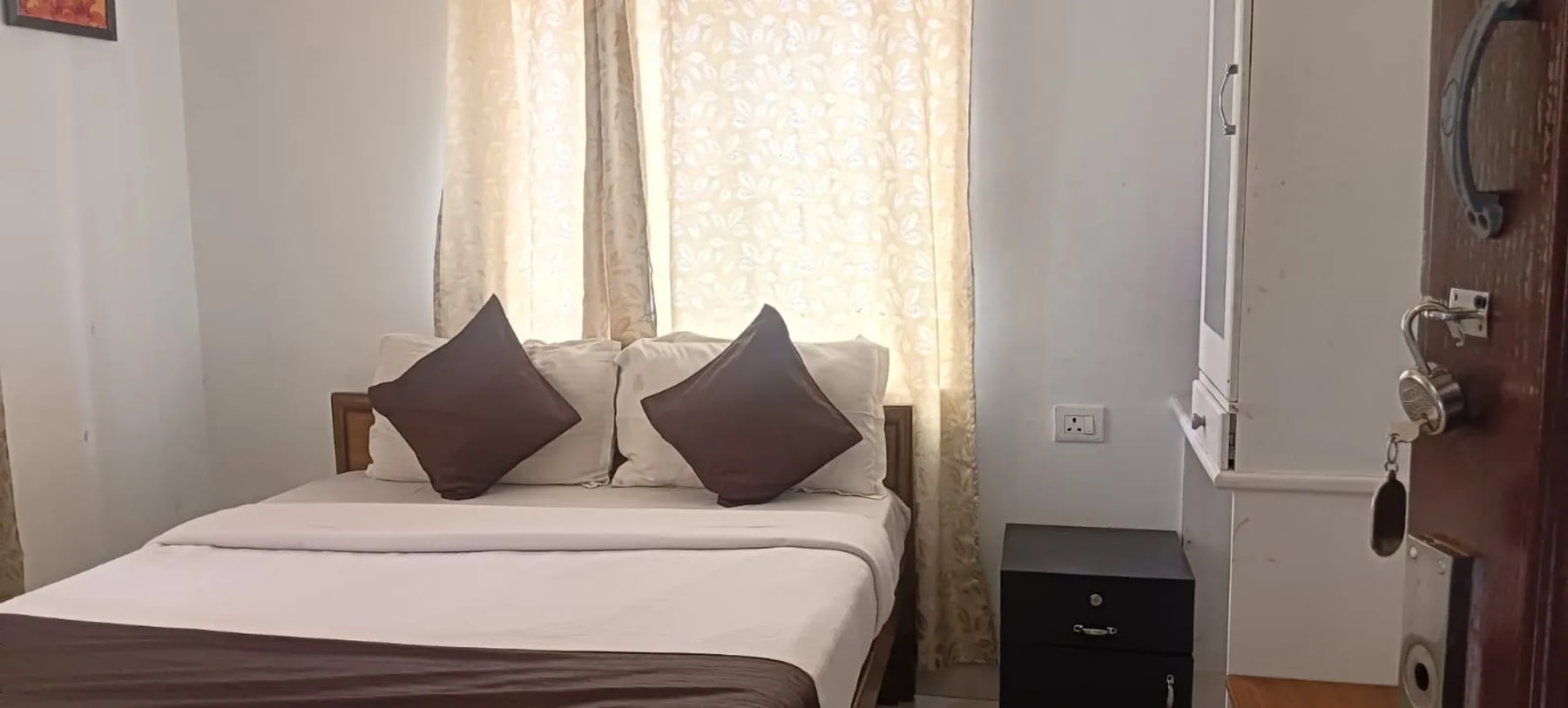 Comfortable bedroom at Bala Garden Ooty