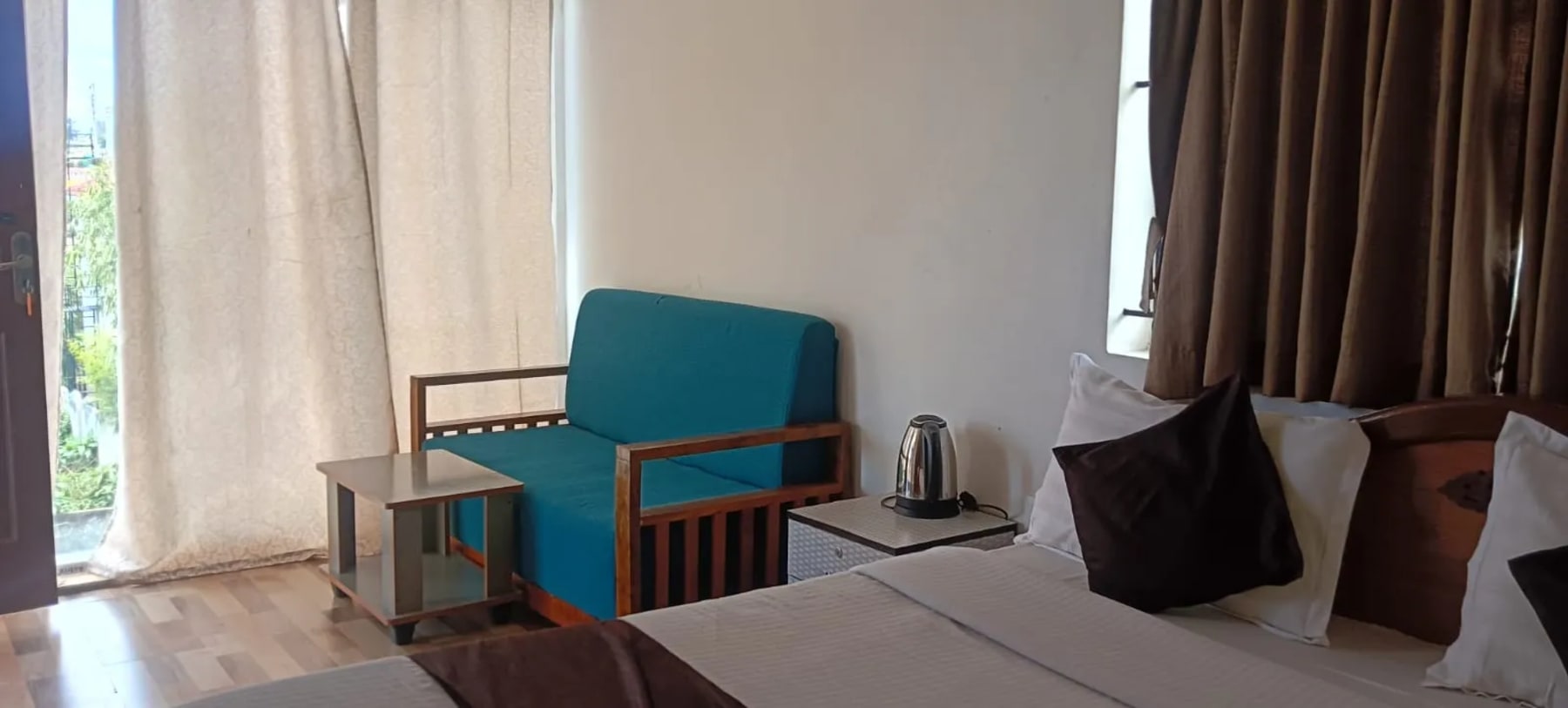Clean bedroom at Bala Garden Ooty