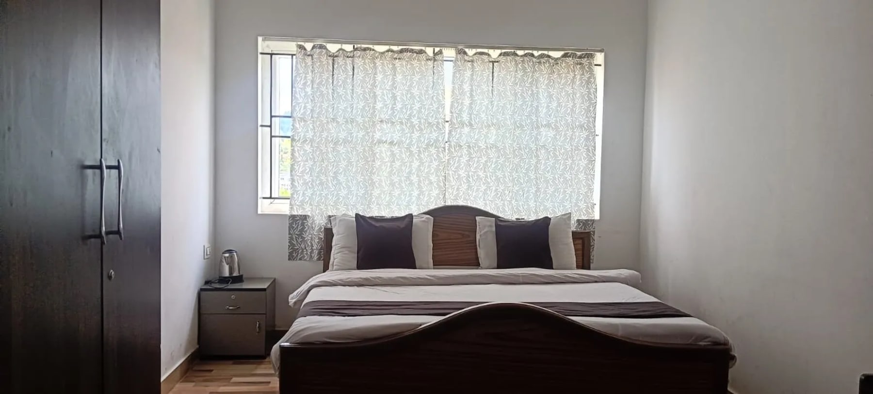 Bedroom accommodation at Bala Garden Ooty
