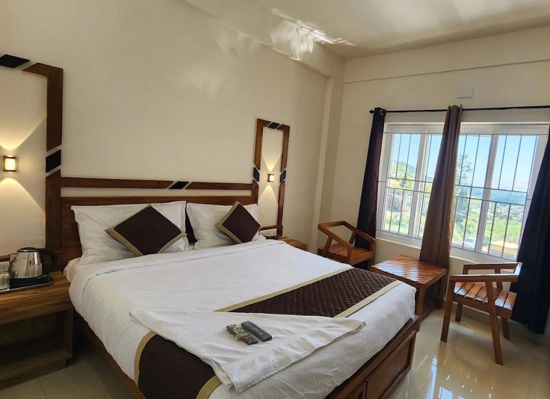 Hotel room at Sviksha Inn Ooty