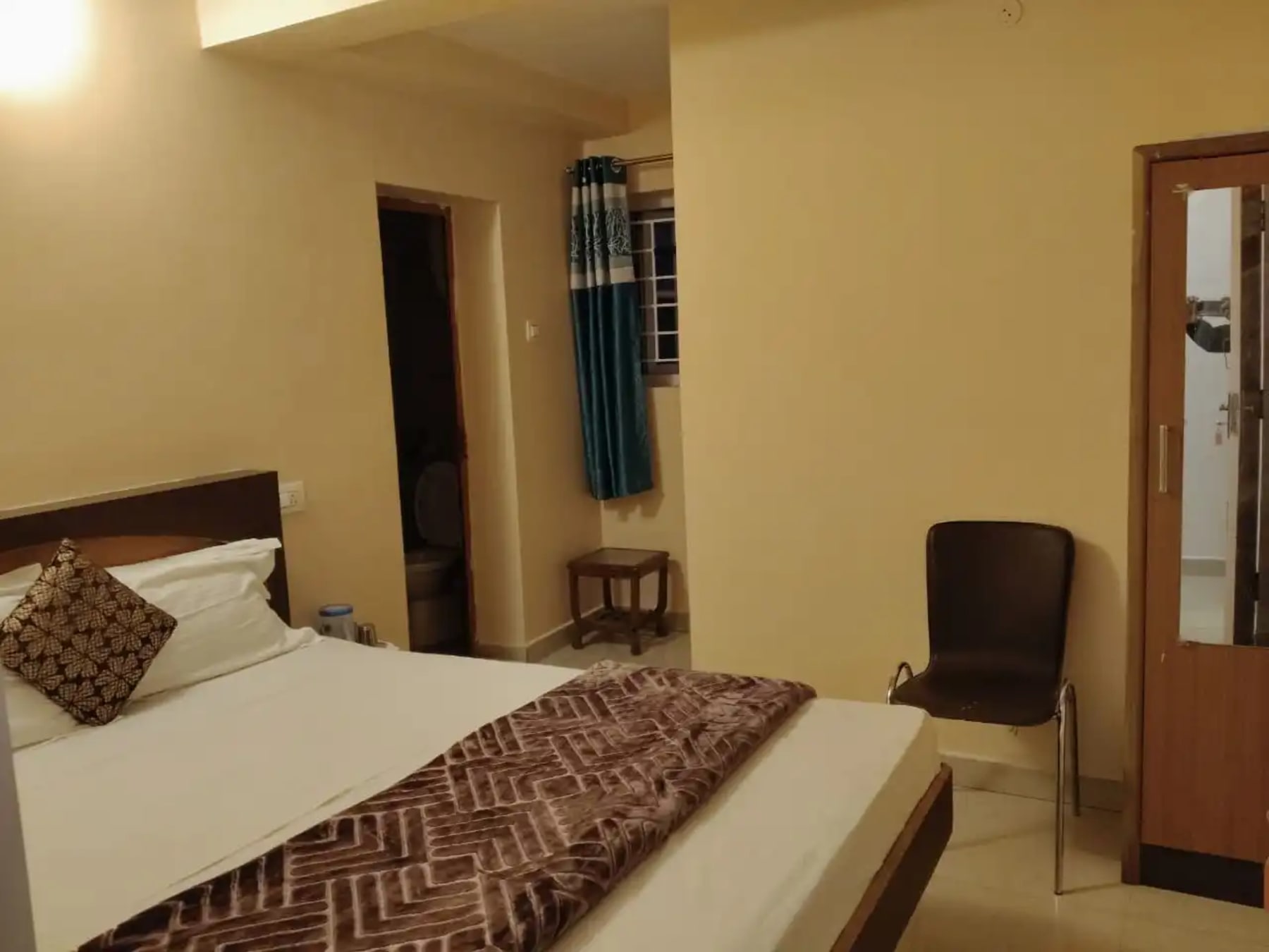 Guest room at Ooty Meridian Residency