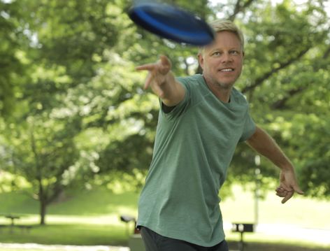 Man throws frisby