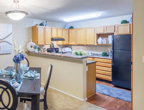 Living Room and Kitchen at The Paddock Club Brandon luxury apartment homes in Tampa, FL