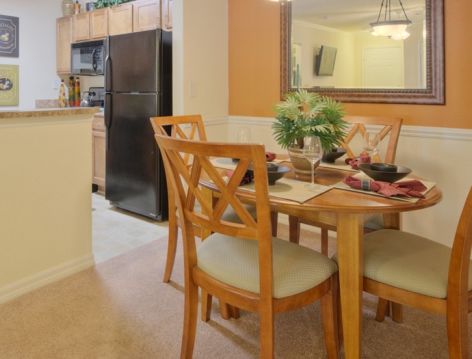 Kitchen and Dining Room at Colonial Grand at Mallard Creek luxury apartment homes in Charlotte, NC