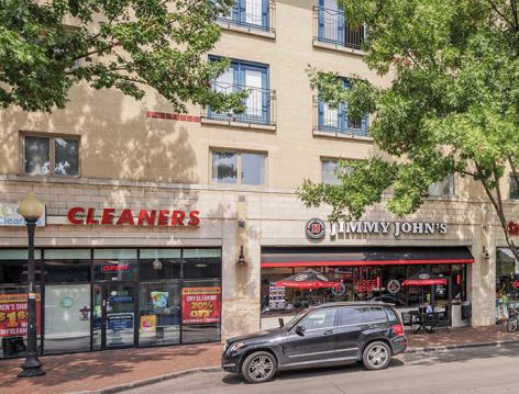 Exterior storefronts at Post Square luxury apartment homes in Dallas, TX