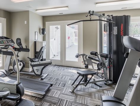 Fitness center at Colonial Village at Greenbrier luxury apartments in Fredericksburg, VA