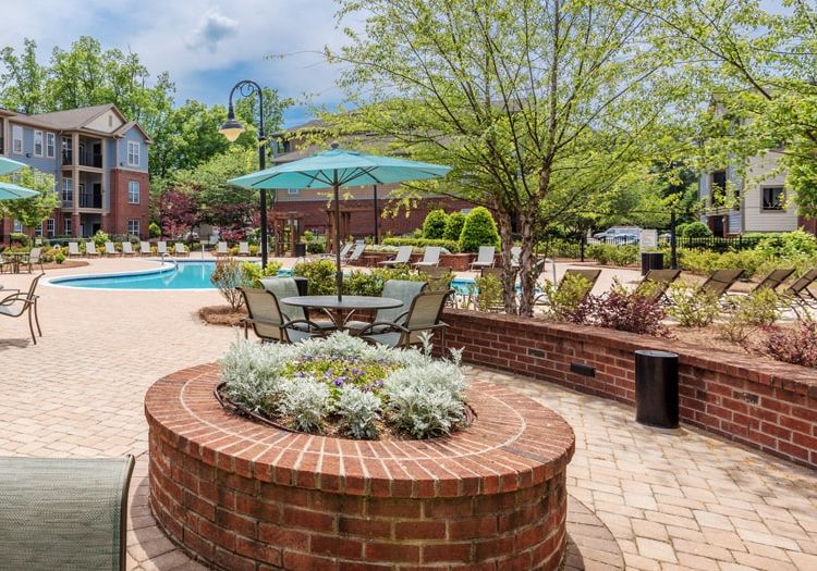 Patio and Outdoor Kitchen at Colonial Grand at Matthews Commons luxury apartment homes in Charlotte, NC